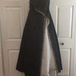 Davids Bridal tea length black dress with white inlet and diamond look beads